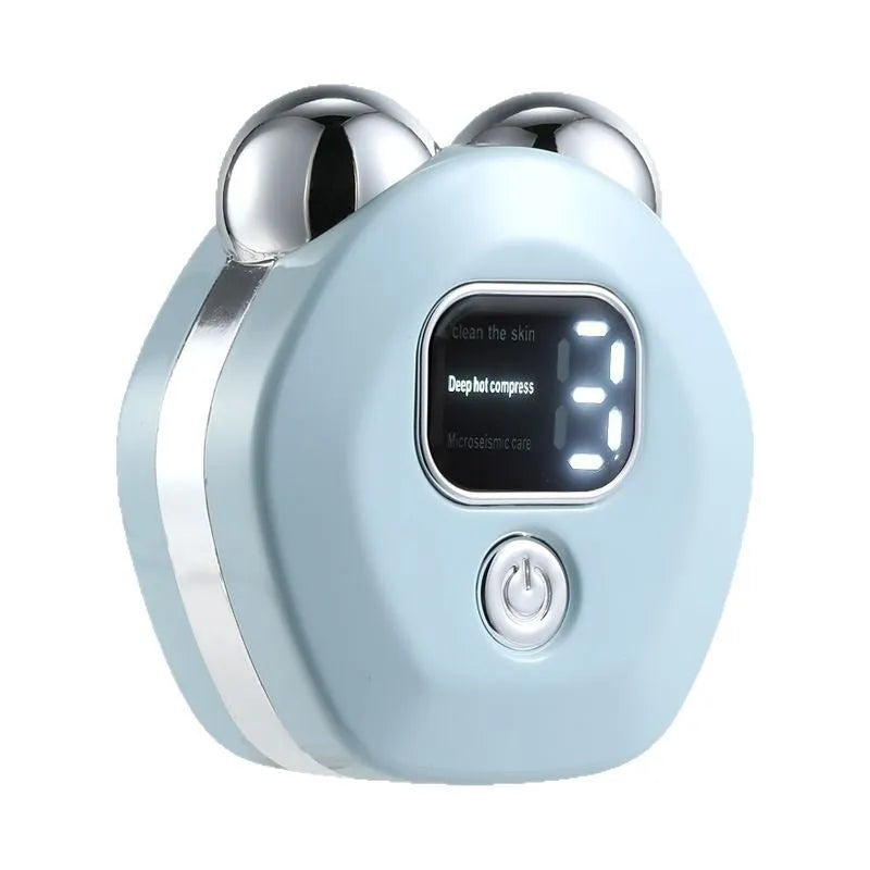 Portable white hot compress micro current facial massage instrument with dual rollers on a pink background.