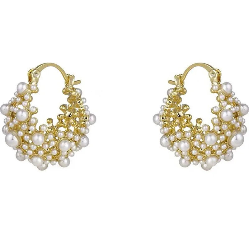 Women's gold flower basket earrings with small beads and pearl inlay details