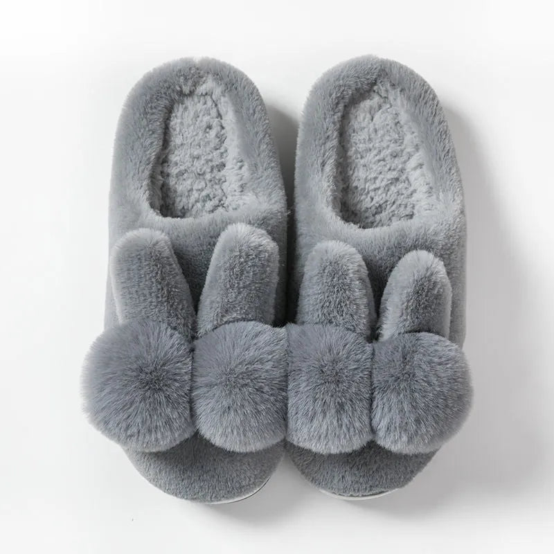 Women's high-top fluffy rabbit fur slippers with floral details in creamy white colour.