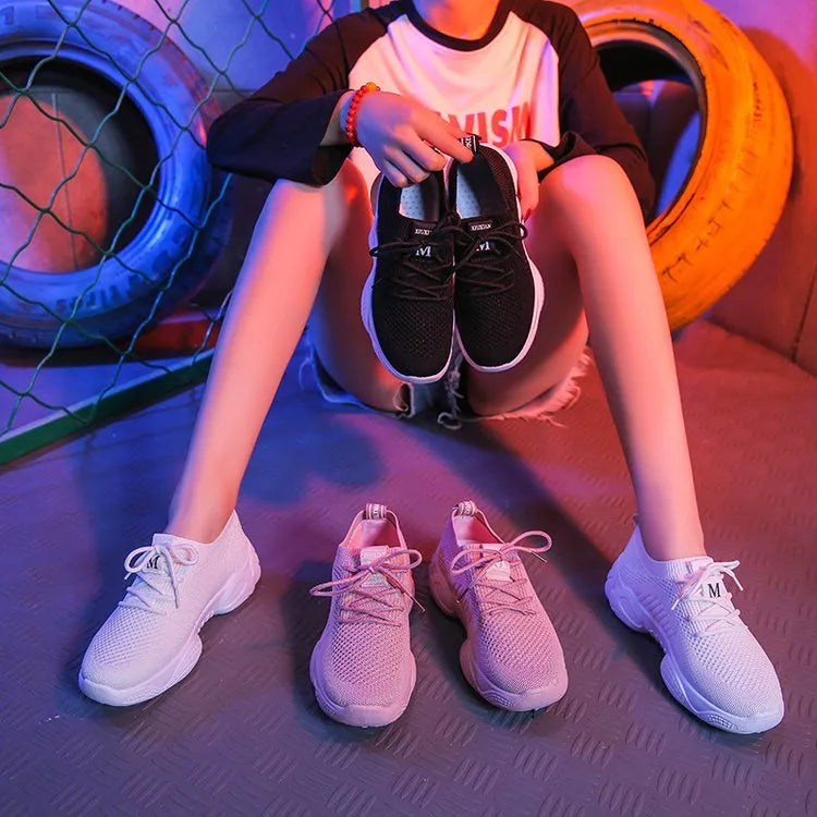Women's white thick-soled sports shoes with woven upper and front strap closure