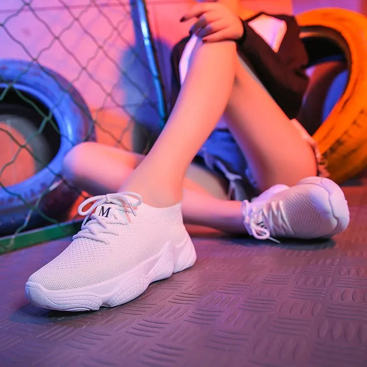 Women's white thick-soled sports shoes with woven upper and front strap closure