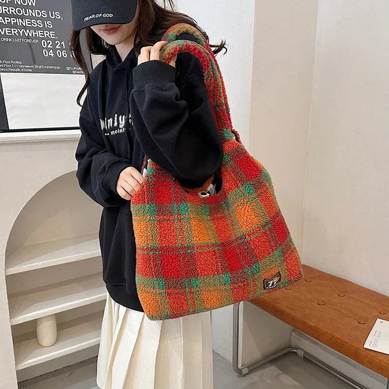 Women's soft plush plaid crossbody tote bag in Army Green showing large capacity and strap-free design.
