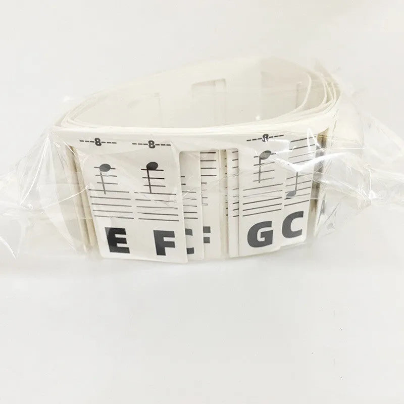 88 key piano keyboard stickers with staff notation and colour-coded note bars on white card