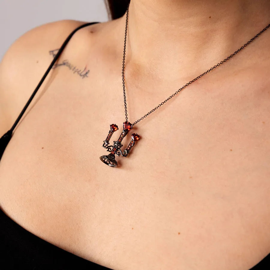 Women's Gothic necklace with detailed hollow candlestick pendant on cross chain