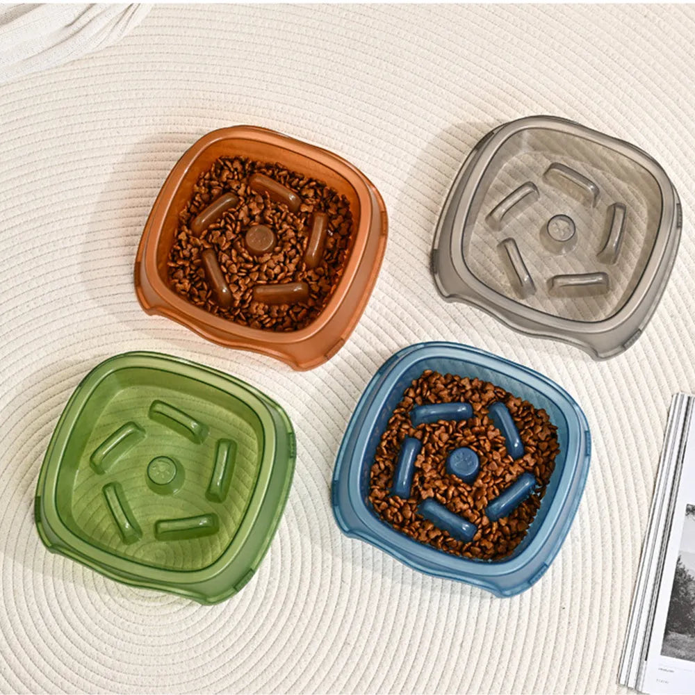 Blue plastic dog slow feeder bowl with interior ridges to control eating speed