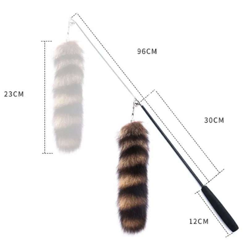 Black cat toy wand teaser with long elastic string stretched out for play.