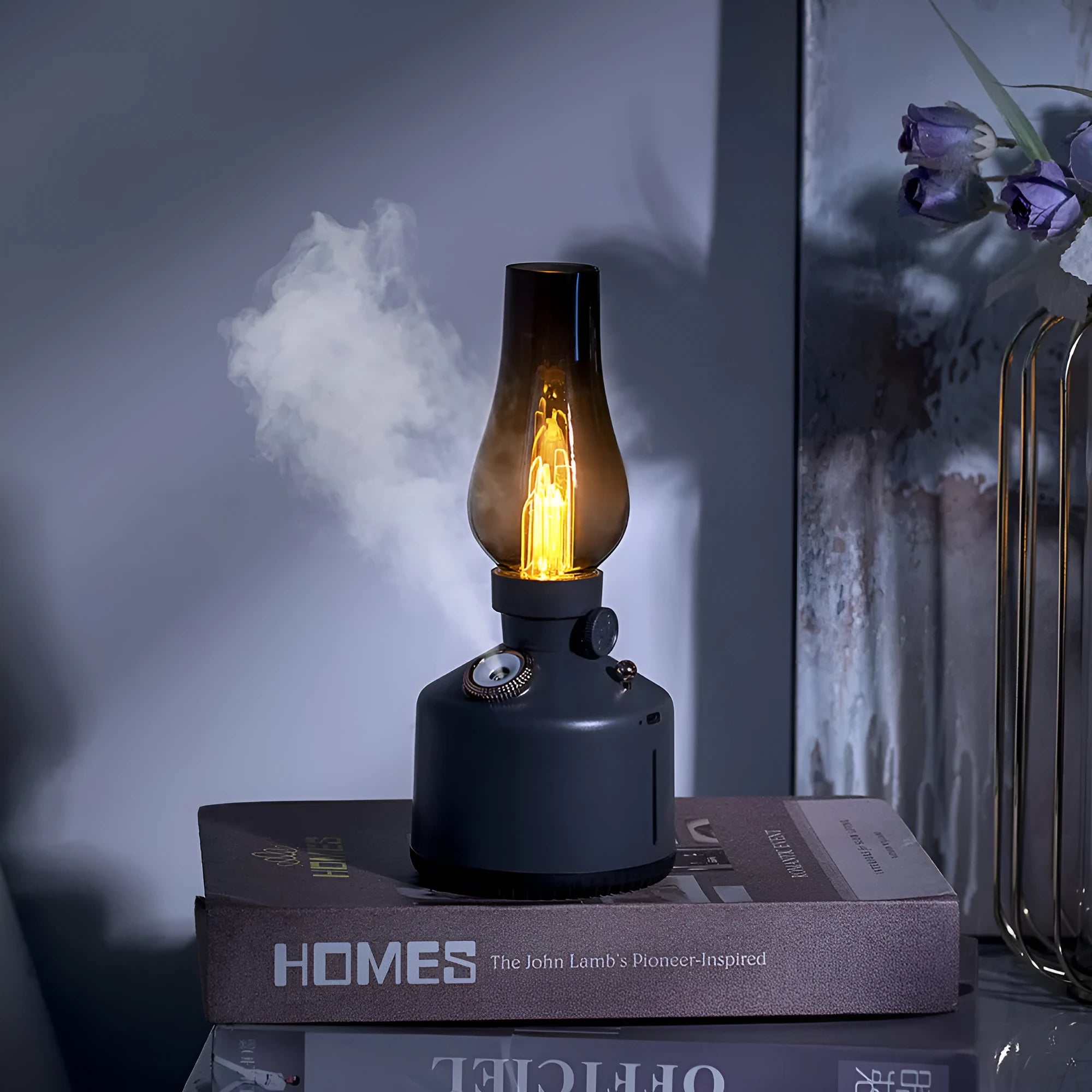 Kerosene lamp ultrasonic humidifier and aroma diffuser with ABS shell in brass color on a table