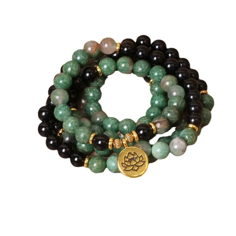 Green and black elastic beaded bracelet made from alloy material with natural styling