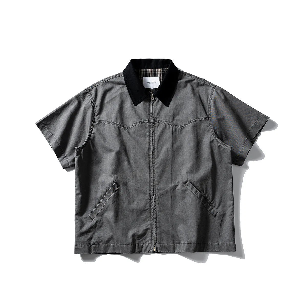 Khaki and grey washed cotton short-sleeved overalls shirt with a loose cardigan fit.