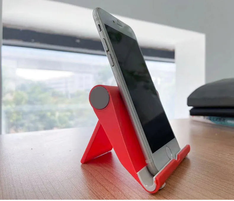 PE folding mobile phone and tablet desktop stand in black on a white background