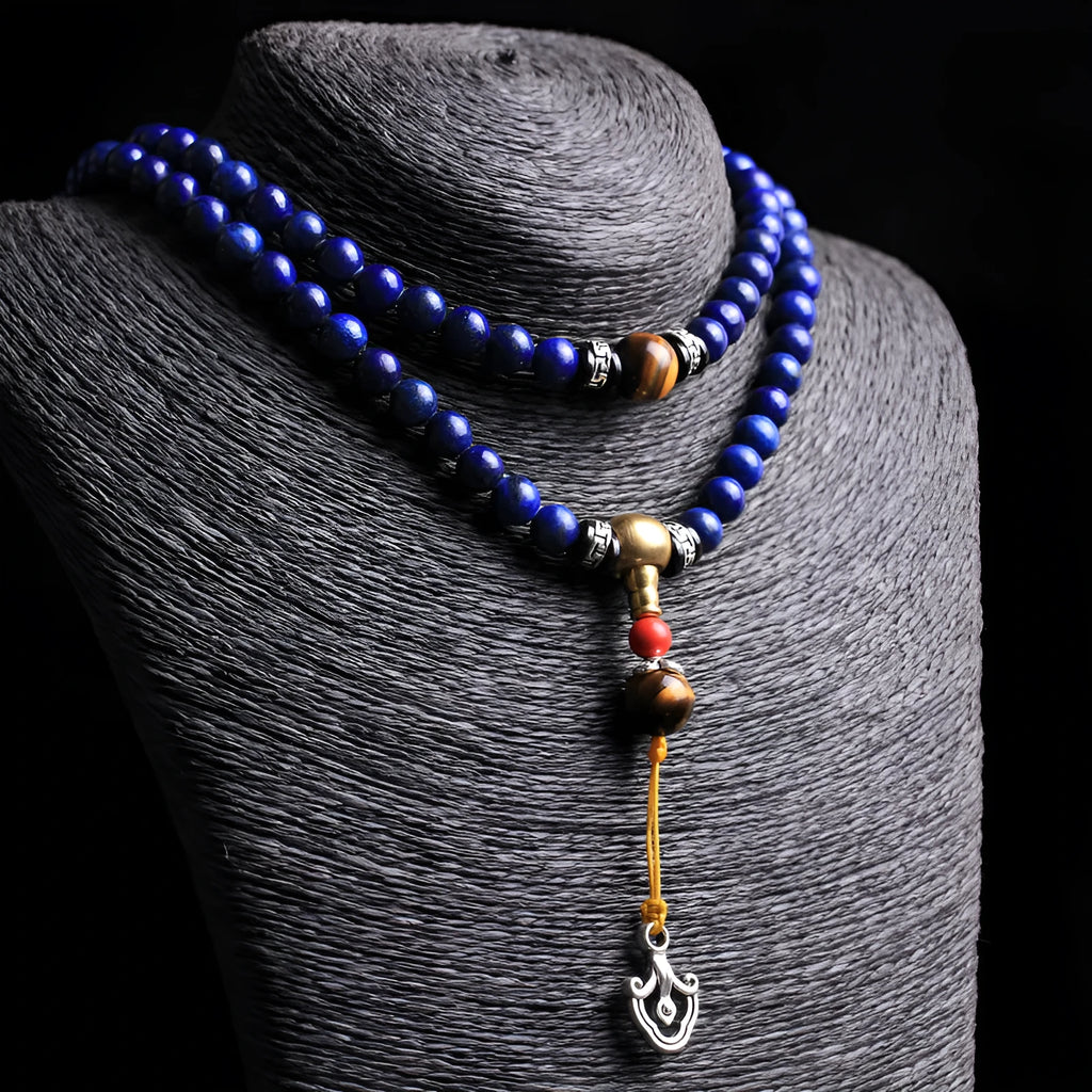 Natural Lapis Lazuli 108 bead bracelet in 8mm size on unisex wrist showing deep blue stone beads