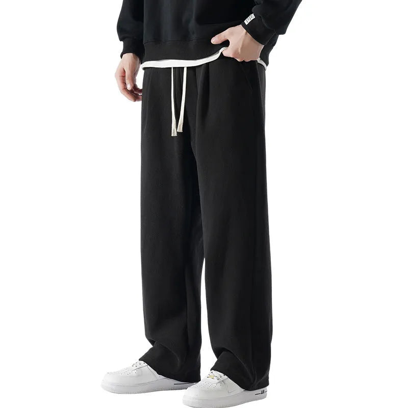 Men's polar fleece fleece-lined winter trousers in loose fit with drawstring waist