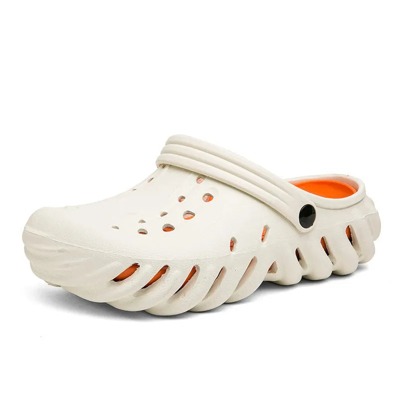 Men's beige ventilated EVA slipper sandals with hollow out design and round toe on a plain background.