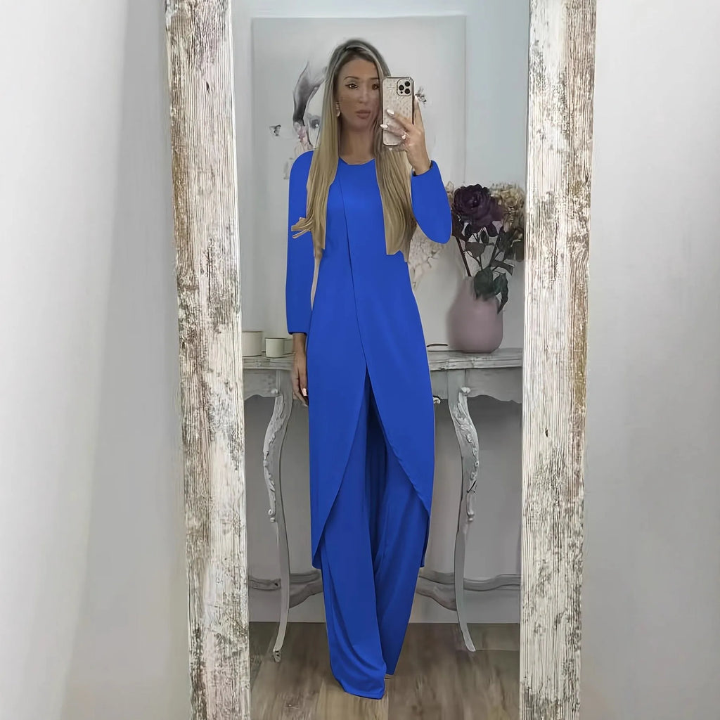 Casual long sleeve top and trousers lounge set in black, shown on a hanger