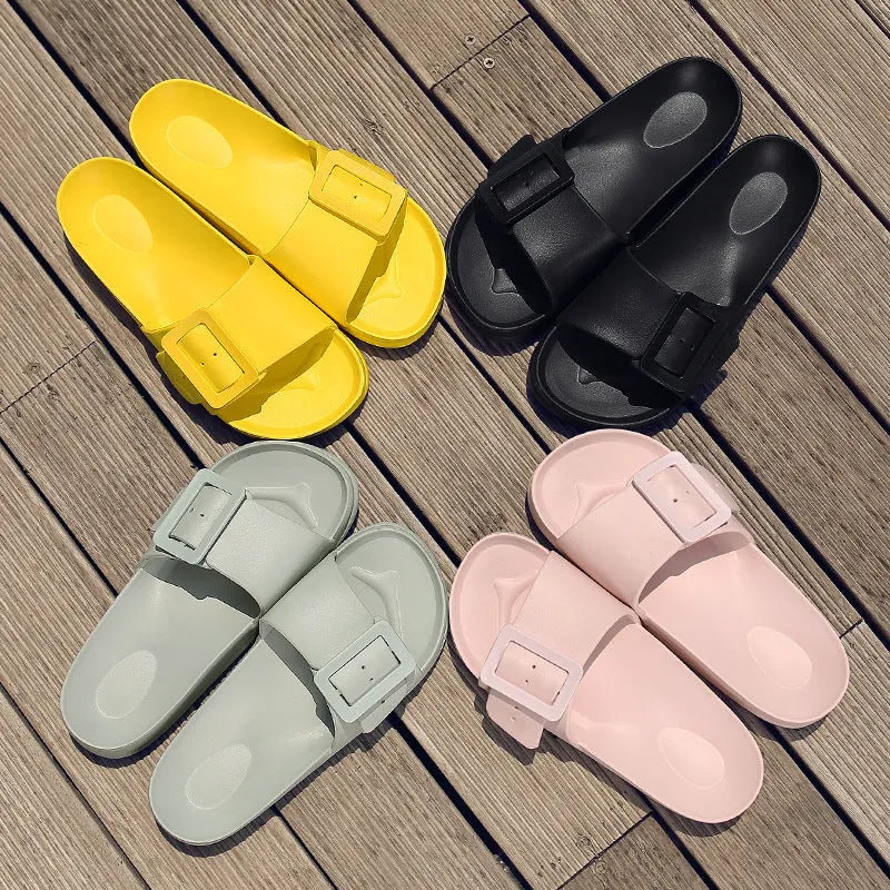 Women's grey blue EVA buckle slippers showing adjustable strap and soft sole.