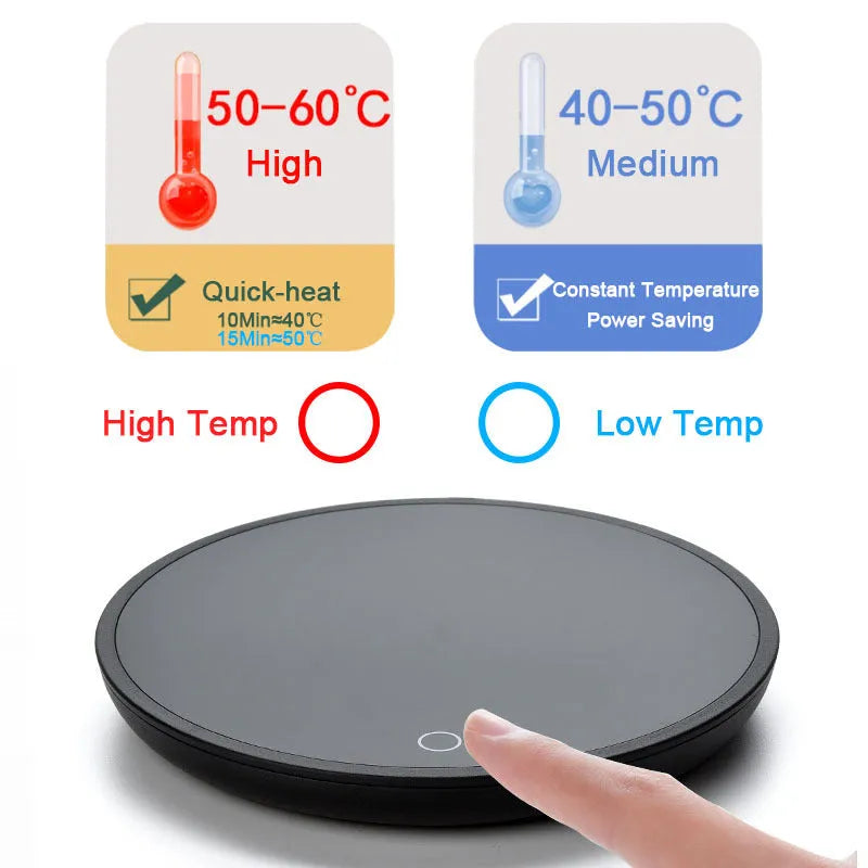Black coffee mug warmer with temperature control dial on desk