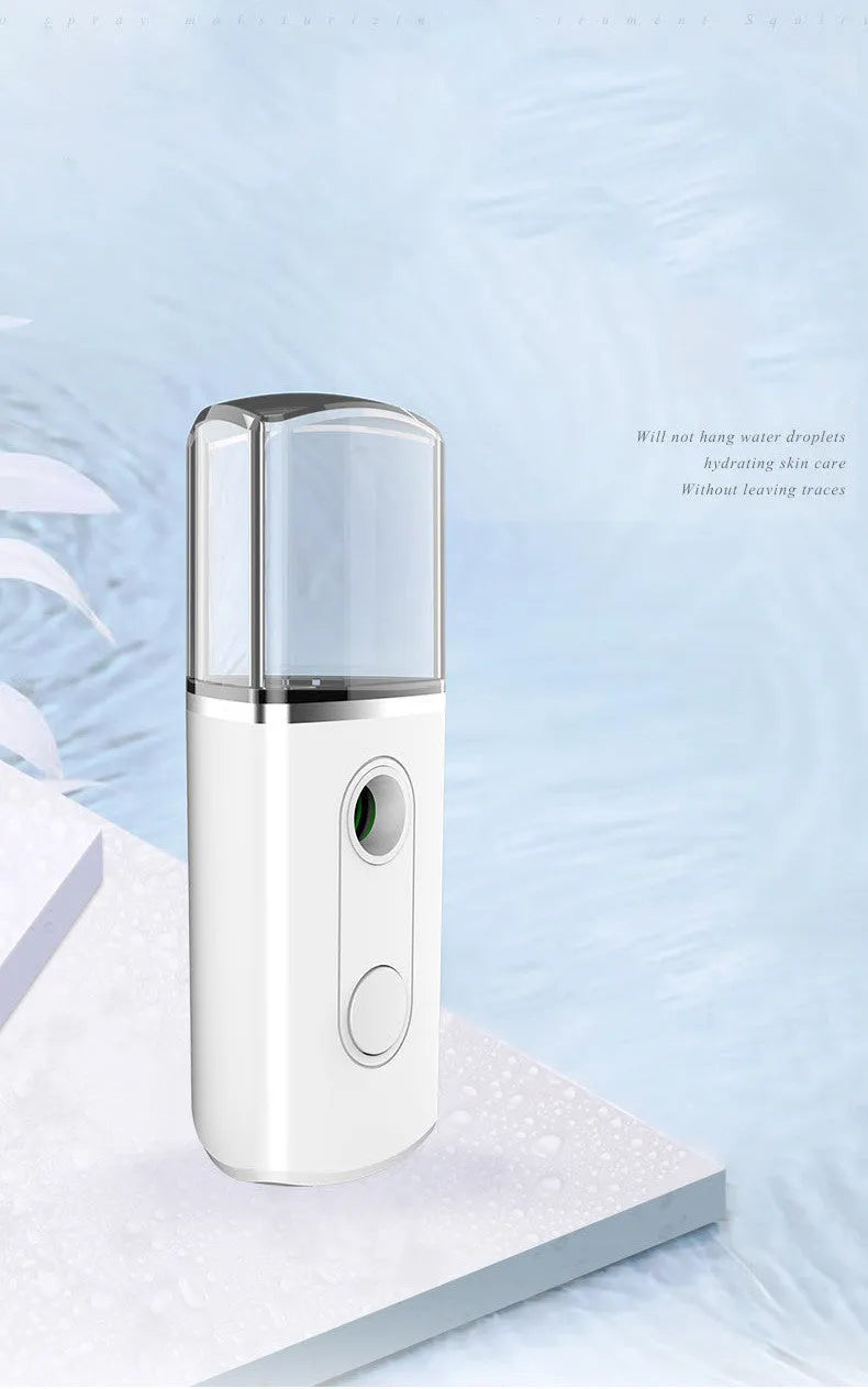 Portable facial nano mist humidifier in white with 20ml tank and compact 10cm body
