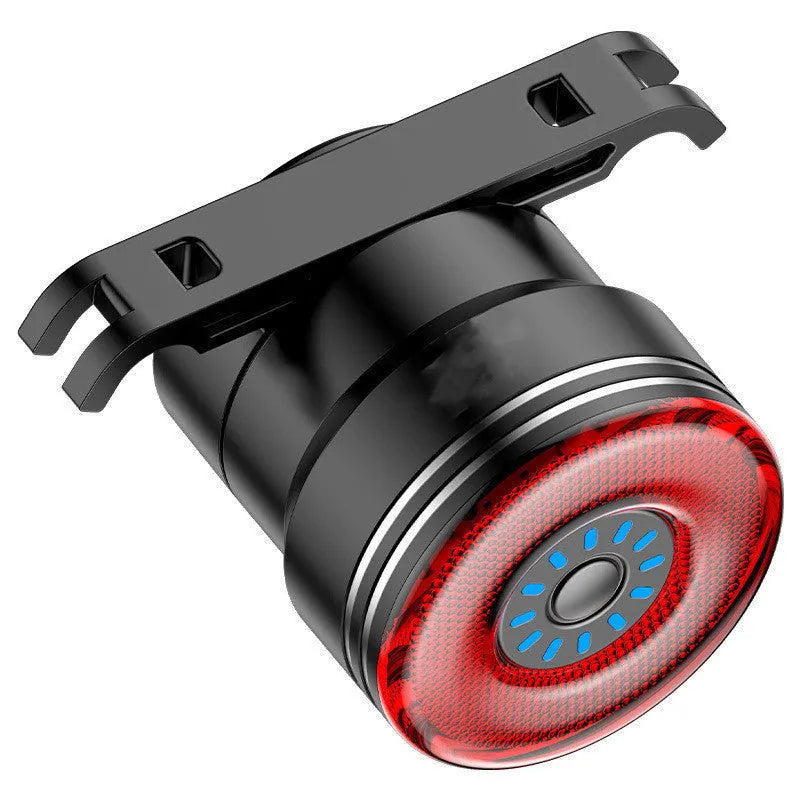 Black aluminium smart brake sensing USB rechargeable bicycle taillight showing compact size.