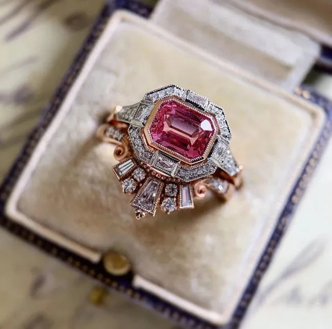 Rose gold geometric retro-style women's fashion ring with ruby aesthetic detail
