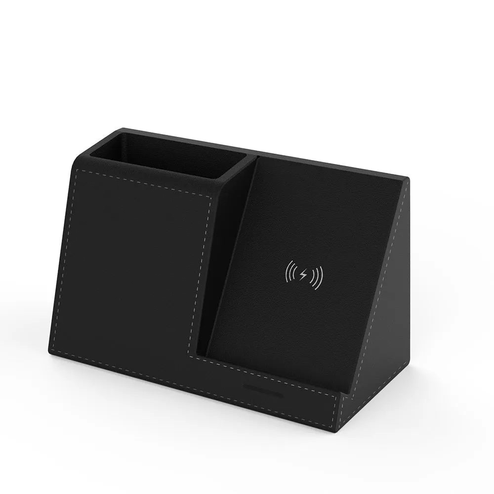 Black leather desk organiser with wireless phone charging surface and pen holder compartment