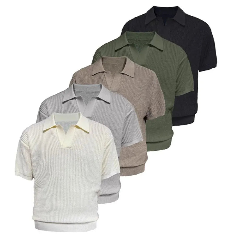 A creamy-white loose-fit polo shirt with a striped collar and short sleeves on a hanger.