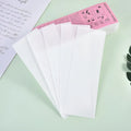 A pack of white non-woven fabric hair removal wax strips for body waxing.