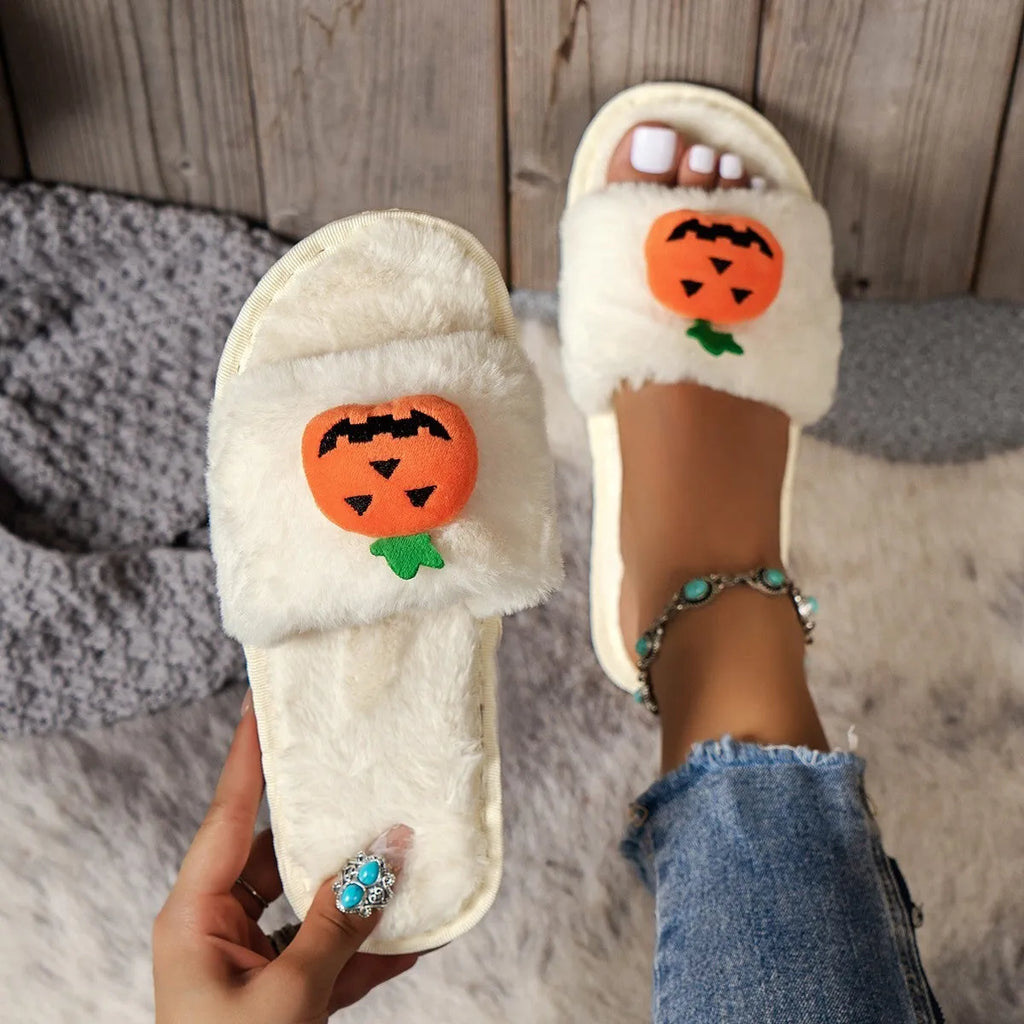Yellow pumpkin cartoon plush slippers with synthetic fur upper and PVC sole, open toe design.