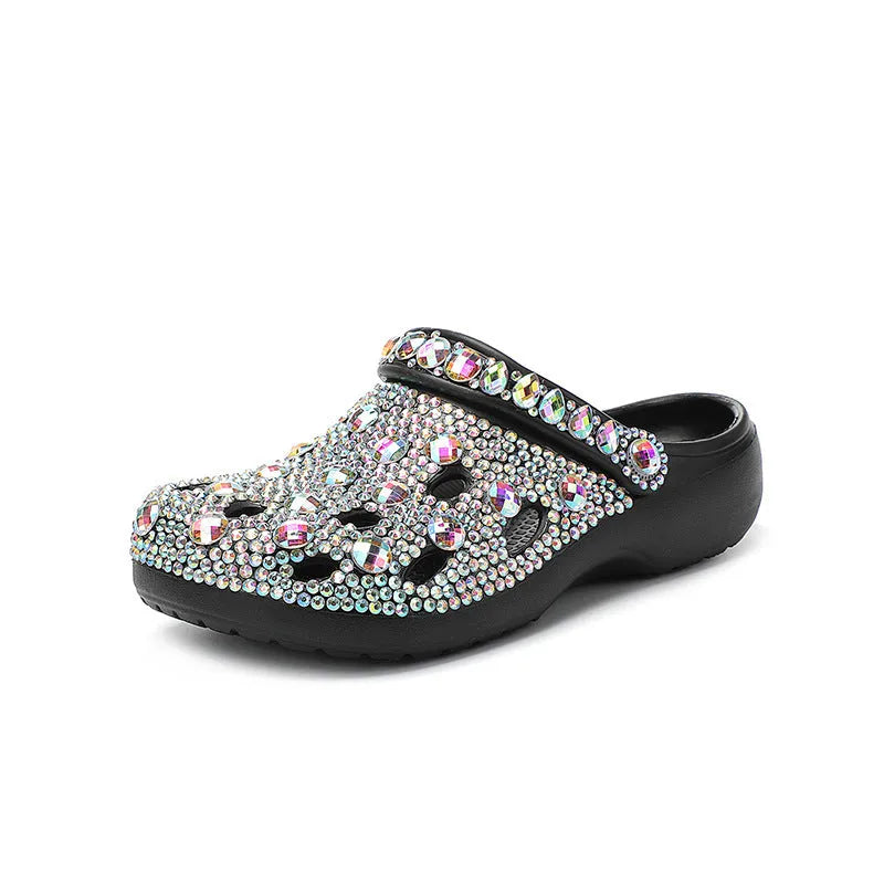 Black platform sandals for women with rhinestone detail on EVA upper and sole.