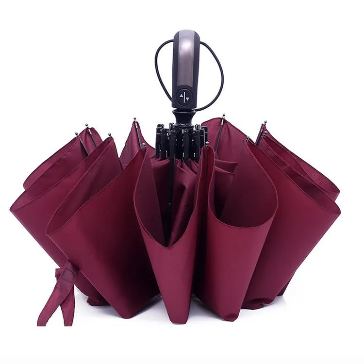 Large black automatic triple-fold business umbrella with steel ribs and rubber handle