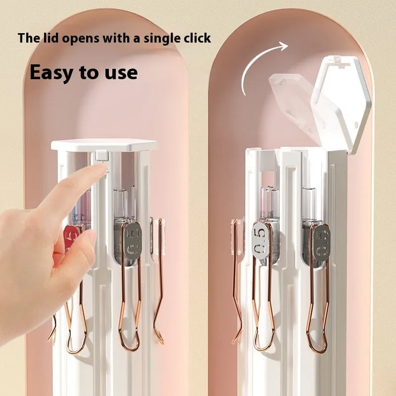 A pressing pen next to a Sky Blue plastic pencil case from a six-pen or sixteen-pen kit.