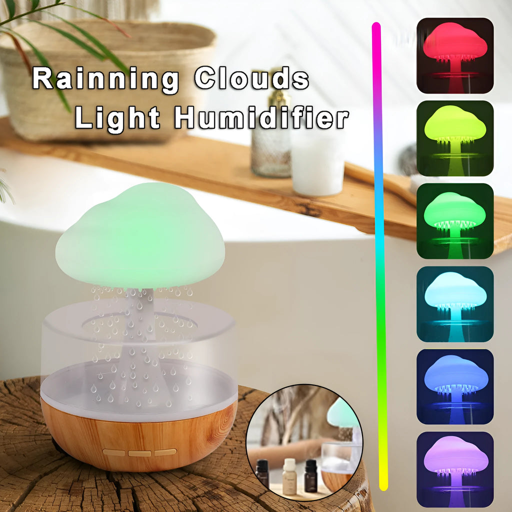 White raining cloud humidifier with essential oil diffuser and multi-colour night light on table