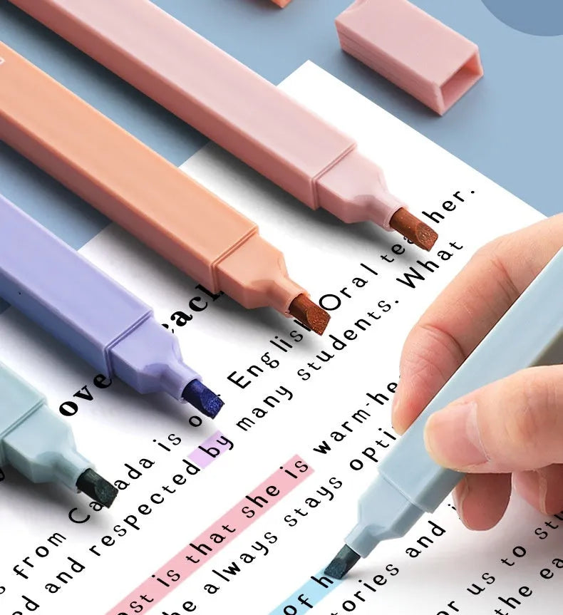 Pack of twelve double-ended fluorescent marker pens in assorted bright colours on a white background.