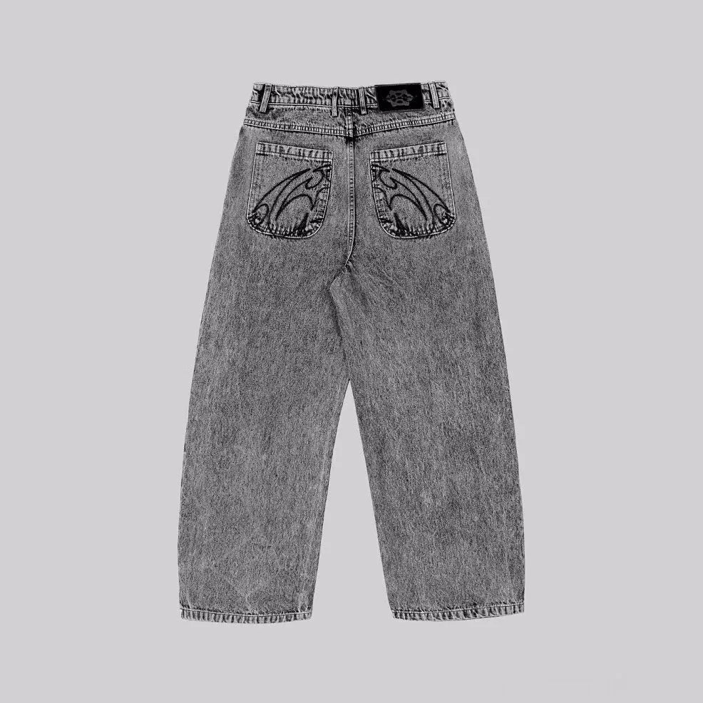 Grey loose straight-leg cotton denim trousers on a hanger, showing mid waist and straight leg cut.