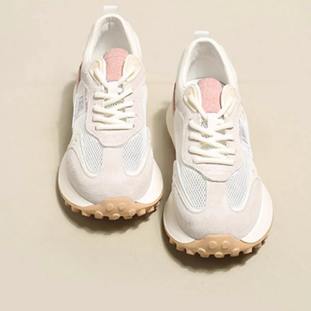 Women's grey and pink retro sneakers with low-top design and rubber sole