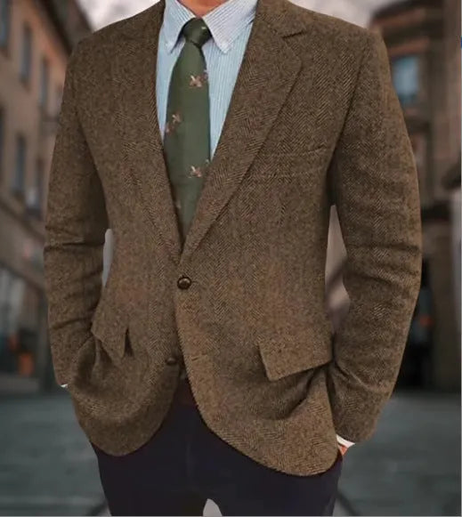 Man wearing a brown herringbone pattern retro suit jacket with a long sleeve cut.