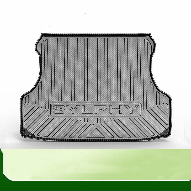 Black car boot liner with carbon fibre pattern, designed for a model-specific TPE tail pad fit.