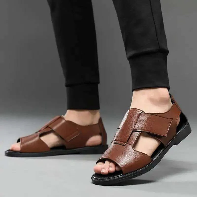 Men's black leather Roman sandals with open-toe design and rubber sole