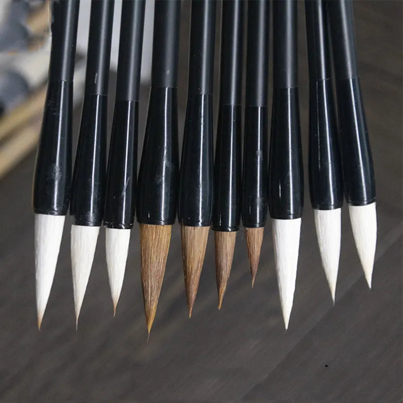 Traditional Chinese student calligraphy brush with Jianhao nib and steel barrel, 23cm length
