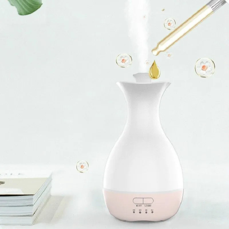 White or pink ultrasonic aromatherapy vase humidifier with colourful night light feature