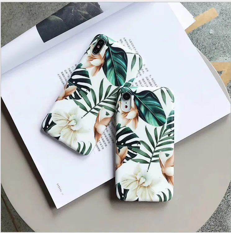 Green banana leaf floral pattern TPU phone case for iPhone on wooden surface