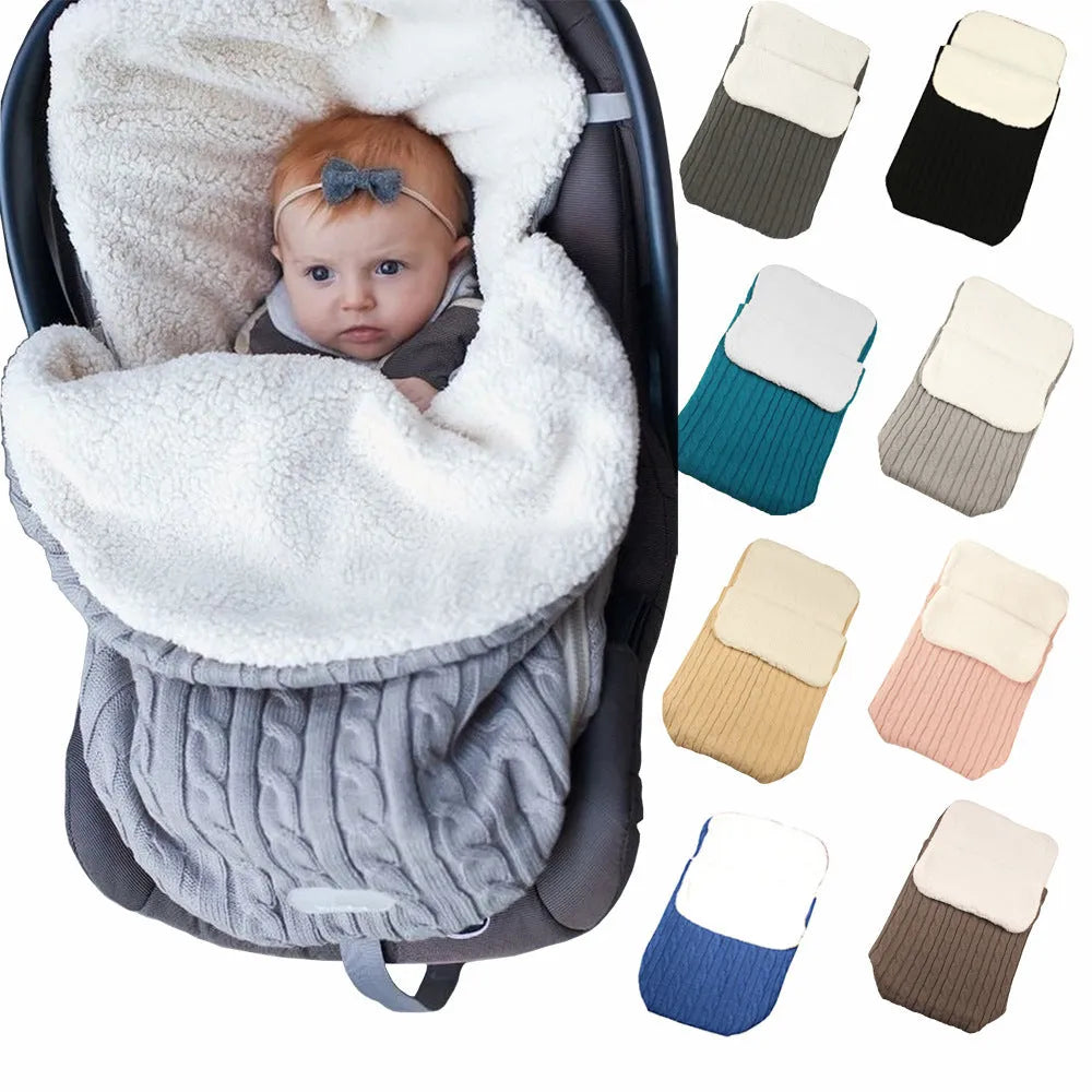 Baby stroller sleeping bag in an envelope style shown in a light grey colour, suitable for winter pram use.