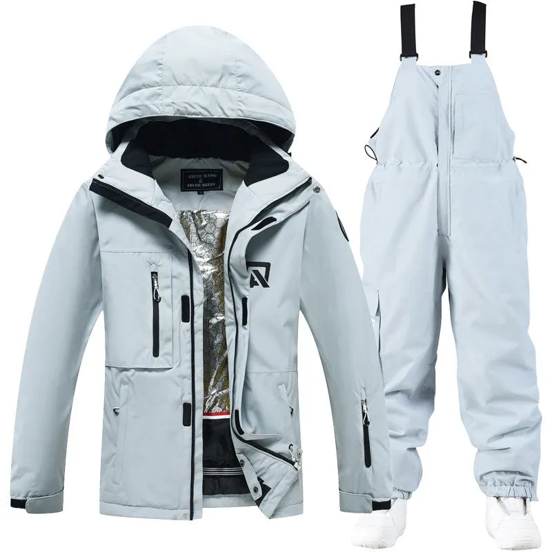 Men's and women's winter ski suit in blue top and black pants, waterproof and windproof for snow sports