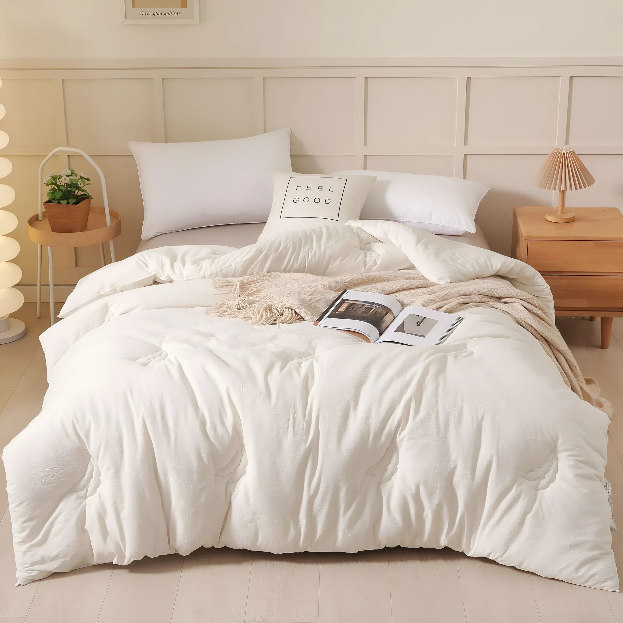 Soybean fibre pure cotton quilt shown in grey, pink jade or white colour on a bed.