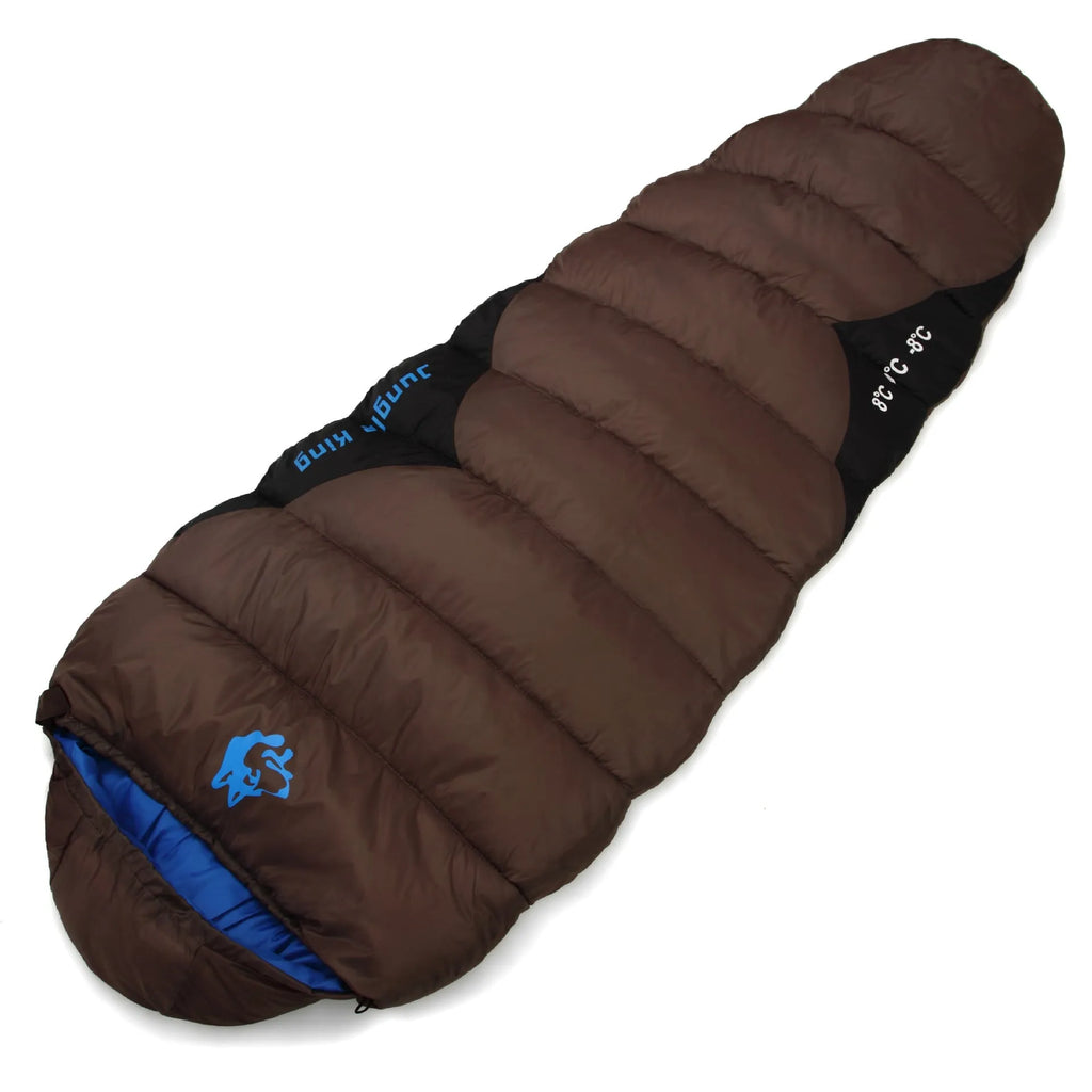 Cotton sleeping bag compressed in storage bag beside expanded sleeping bag showing 230cm length