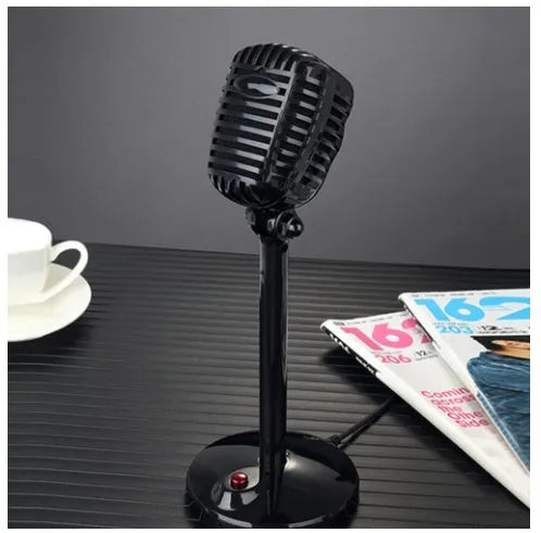 Black USB desktop computer microphone on a stable stand with an adjustable neck.