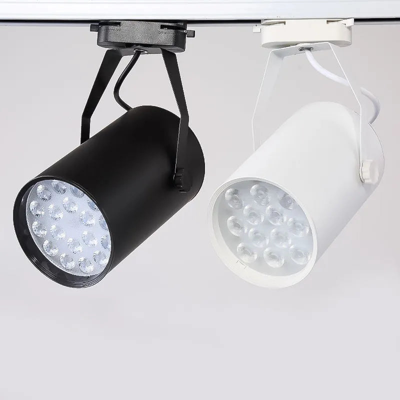 LED track spotlight with a slide mount in a choice of black or white aluminium shell.