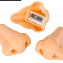 Flesh colour plastic pencil sharpener with geometry shape measuring 58×45×30mm for student stationery