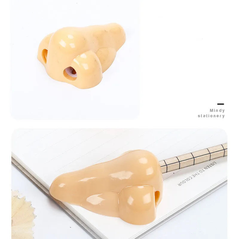 Flesh colour plastic pencil sharpener with geometry shape measuring 58×45×30mm for student stationery