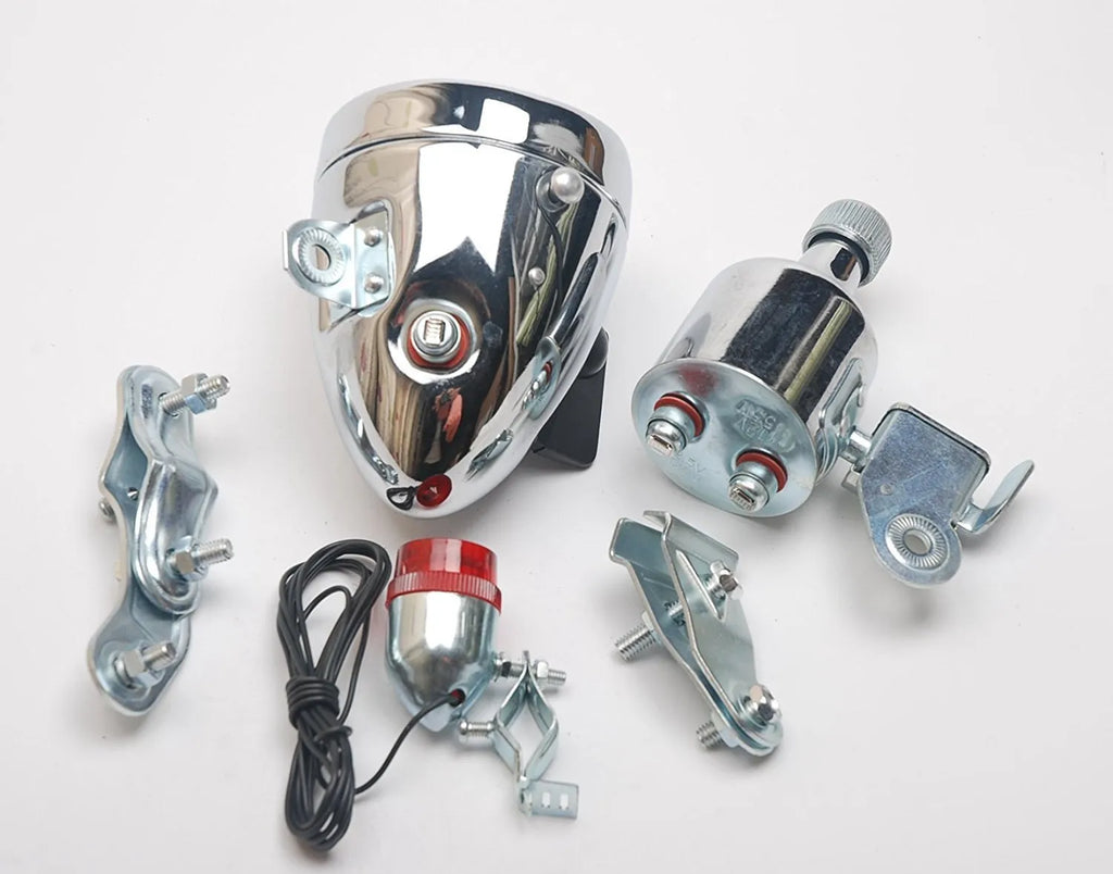 Silver bicycle dynamo-powered generator light set for front and rear bike lighting.