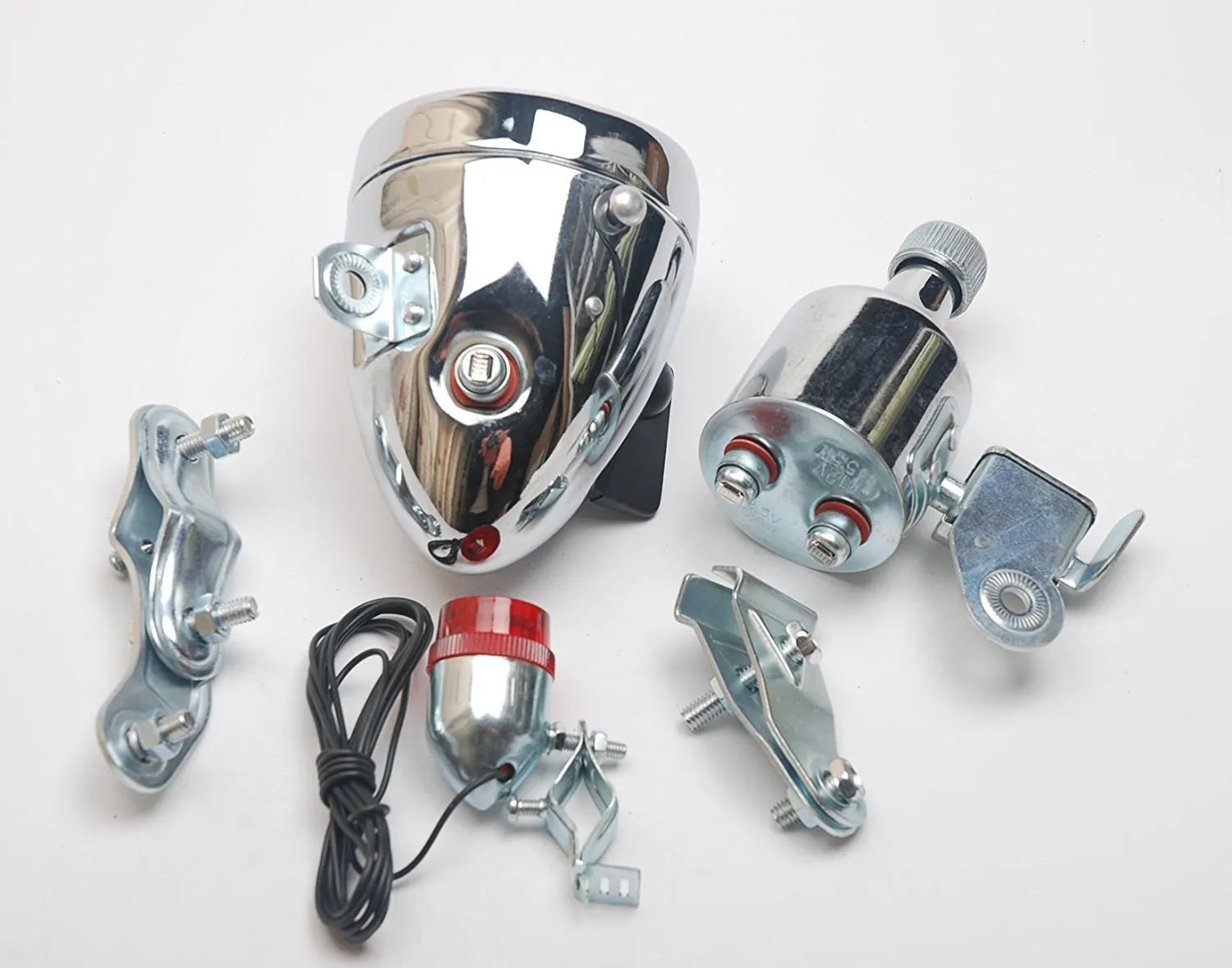 Silver bicycle dynamo-powered generator light set for front and rear bike lighting.